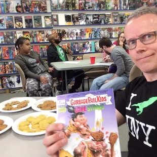 Signing Garbage Pail Kids Love Stinks at my comic book store of choice in OKC! Buy a comic and I&apos;ll toss you a cookie!