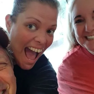 a man and woman taking a selfie