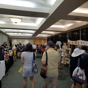 Vendors and crafts indoors.