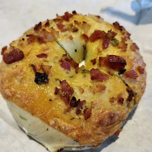 Bacon and cheddar bagel with cream cheese