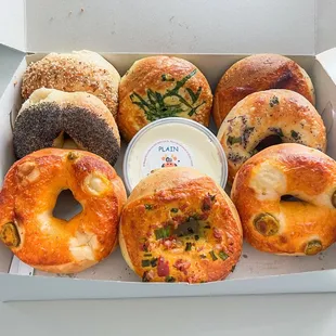 Poppy seed bagel, everything bagel, bacon and cheese bagel, jalapeño and cheese bagel, spinach and Swiss bagel