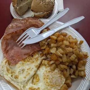 Two egg breakfast with everything bagel.