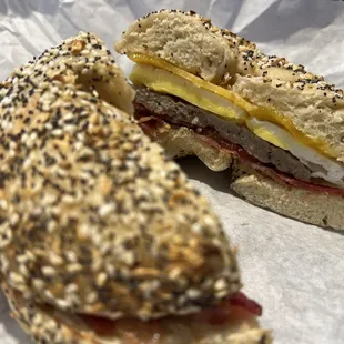 Everything bagel with egg, sausage, bacon, and cheddar.