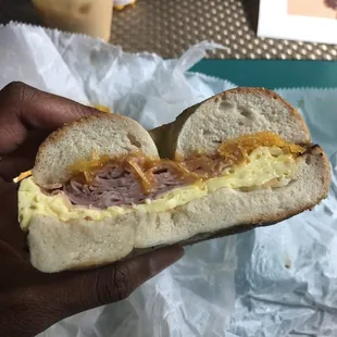 Bagel sandwich: ham, egg, cheddar
