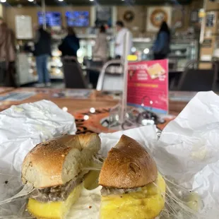 Breakfast bagel with a lot of cream cheese