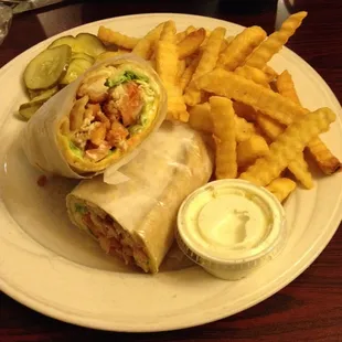 Chicken tender pita with the worlds largest pile of krinkle fries &amp; pickles
