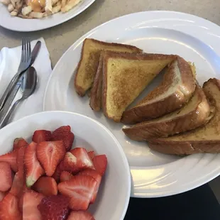French toast and a side of strawberries, surprised by presentation.