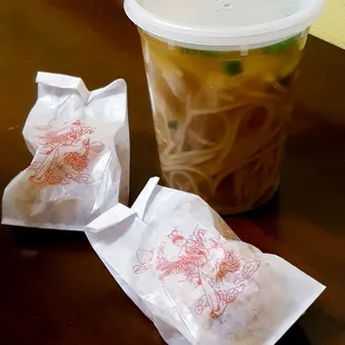 a cup of noodles and a bag of noodles