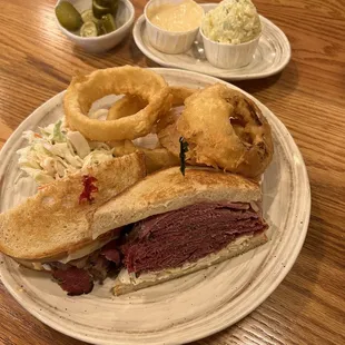Yummm c onion rings, potatoe salad and coleslaw :)