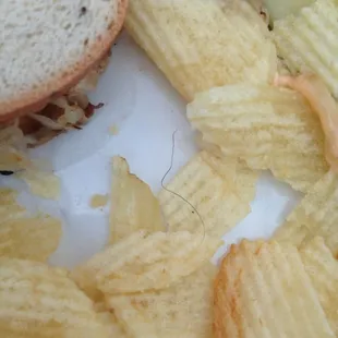 Nice black hair in my food.