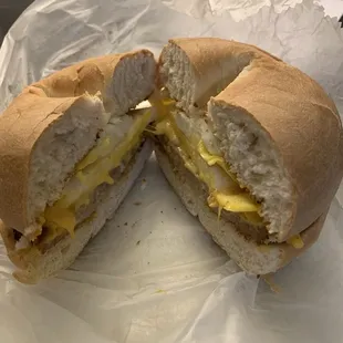 Sausage, Egg &amp; Cheese breakfast sandwich on plain bagel.