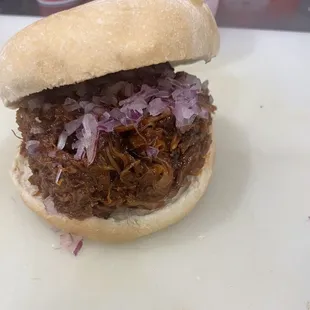 Thursday Special: House Made BBQ Pulled Pork (Smoked Slow Roasted Pork Loin) served on Kaiser this one was with Shaved Red Onion