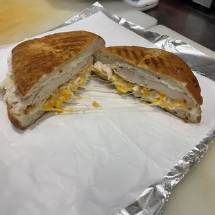 Chicken Panini : Roasted Chicken, Cheddar/Jack Blended Cheese on a Chiabatta Pressed