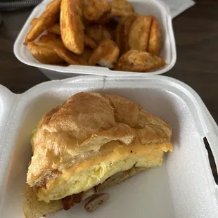 Egg Croissant with cheese and sausage and side of fries. Delicious!!!