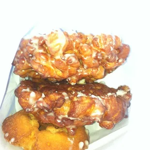 Bought 2 apple fritters and   A glazed old fashioned with 12 donut holes to share. It was under $5!