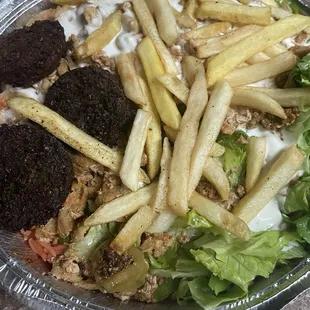 Chicken Platter with added fries, falafel, and lettuce.  Everything was cold and stale.