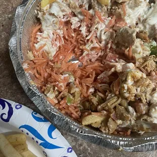 Chicken Platter with added fries, lettuce, and onions.