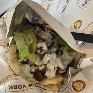 Gyro. You can only add 3 veggies for the regular price