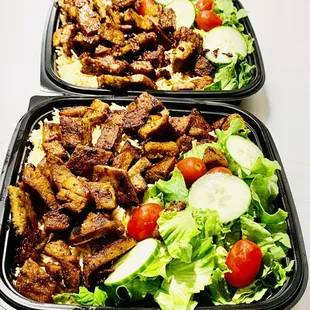 Grilled Lamb over rice and salad.