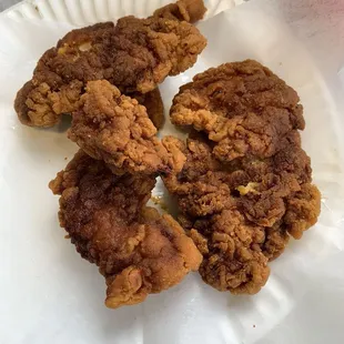 Gross obviously burnt chicken.