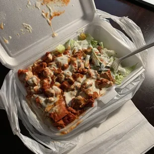 Chicken over rice + salad, with both the white and red sauce. Not pictured: my complimentary Diet Coke