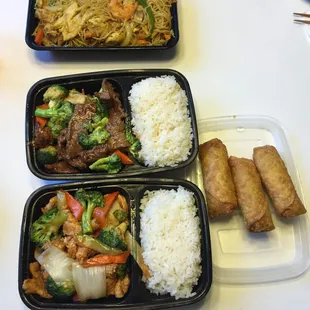 Singapore noodles, beef with broccoli, chicken with veggies. 
 Comes with steamed or white rice, and an egg roll or a soda.