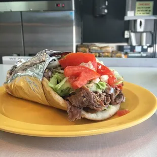 Mega Yeero (Gyro) is a traditional Yeero with Shredded Steak...it&apos;s literally a Big Fat Greek Yeero