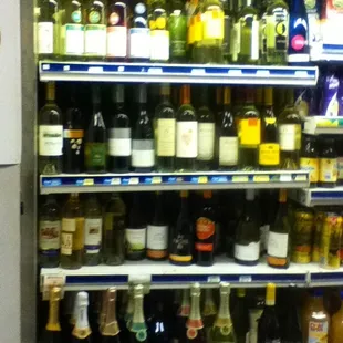 a refrigerator full of wine bottles