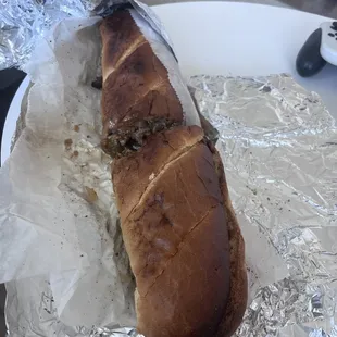 a sandwich wrapped in foil