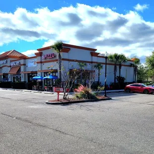 Dec 2021: Exterior Pic 7 of 7-- Walk cautiously near the Dunkin&apos; drive in sign (lots of vehicles)