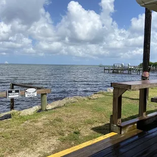 a view of the water from a deck