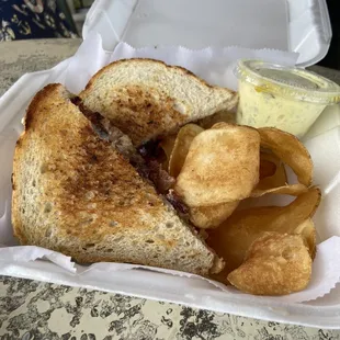 Tuna melt with homemade chips and potato salad