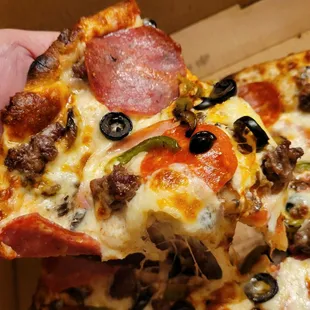 Slice of combo pizza