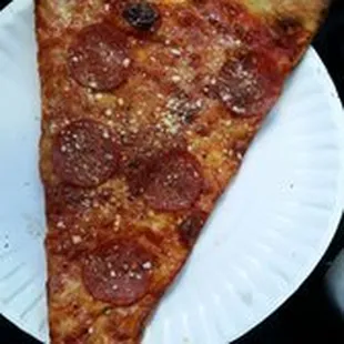 a slice of pepperoni pizza