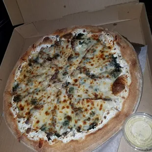 Spinach white, mushrooms, onions anchovies extra cheese Roy hooked it up!!!!
