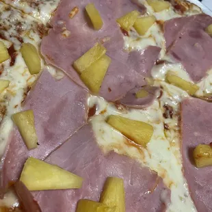 a ham and pineapple pizza