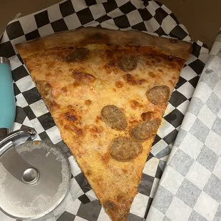 Sausage slice. Not enough toppings for me. We paid $34 for a 24 inch. I don&apos;t plan on coming back