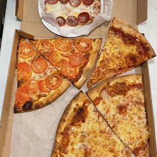 Pizza by the slice looks like one of those Chuck E Cheese conspiracy pizzas - But better AF