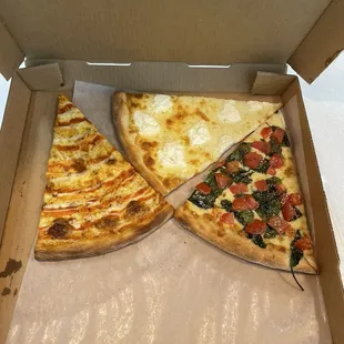 Buffalo Chicken, white, and spinach/tomato slices heated and boxed