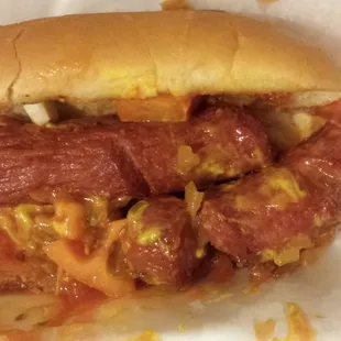 Delivery took an hour+ and we live a few blocks away. Ordered a hot dog and got this misshapen, dried out thing with random toppings????