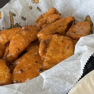 a basket of chicken wings