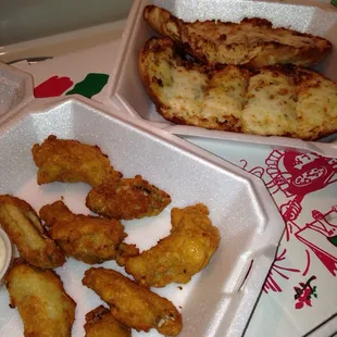 Chicken wings and garlic bread