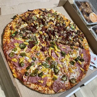 XL half Buffalo Chicken Bacon Specialty Pizza and half Hawaiian with jalapeño