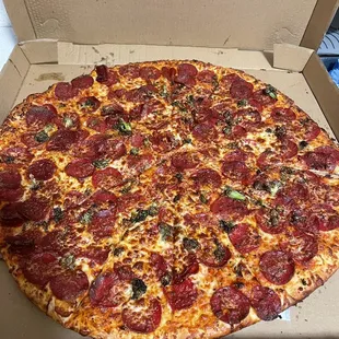 a pepperoni pizza in a box