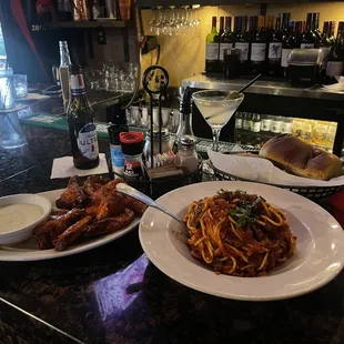 Jumbo Chicken Wings, Spaghetti, martini, and beer.