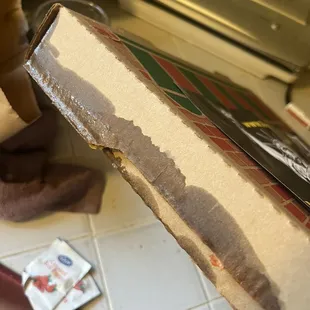the inside of a pizza box