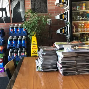 About 1000 menus on one of the tables and two stacks of delivered soda just sitting around.