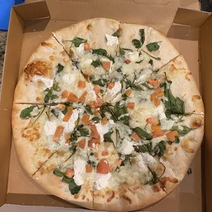 White pizza with lots of dough &amp; not well covered toppings.