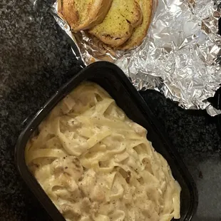 Chicken Fettucini Alfredo pasta. Includes the garlic bread