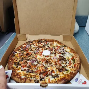 "Large" Greek spinach pizza supposedly worth $26.99. I would rather go to Dominos.